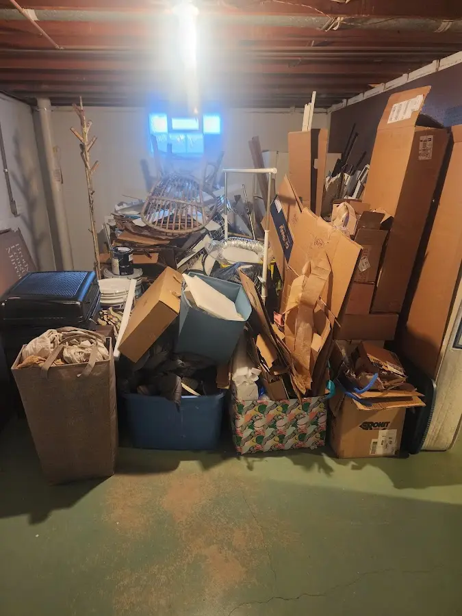 Roll-off dumpster container at job site for Yard Waste Dumpster Rental in Linden